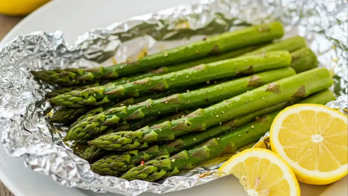 How To Grill Asparagus In Foil – The Best Way To Keep It Tender ext: How to grill asparagus in foil for a tender, smoky, and flavorful BBQ side dish.