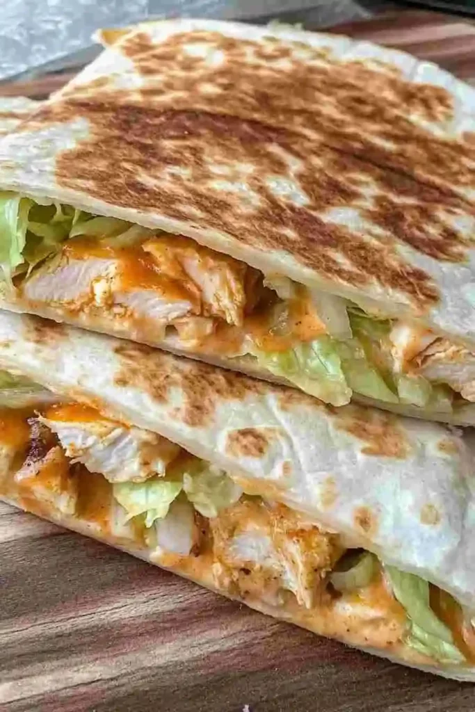 Buffalo Chicken Crunch Wraps: Crispy Flavor in Just 30 Minutes Buffalo Chicken Crunch Wraps with melted cheese and golden crust