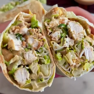 Chicken Caesar Wrap – A Quick and Flavorful Lunch You’ll Love Chicken Caesar Wrap sliced with romaine and parmesan