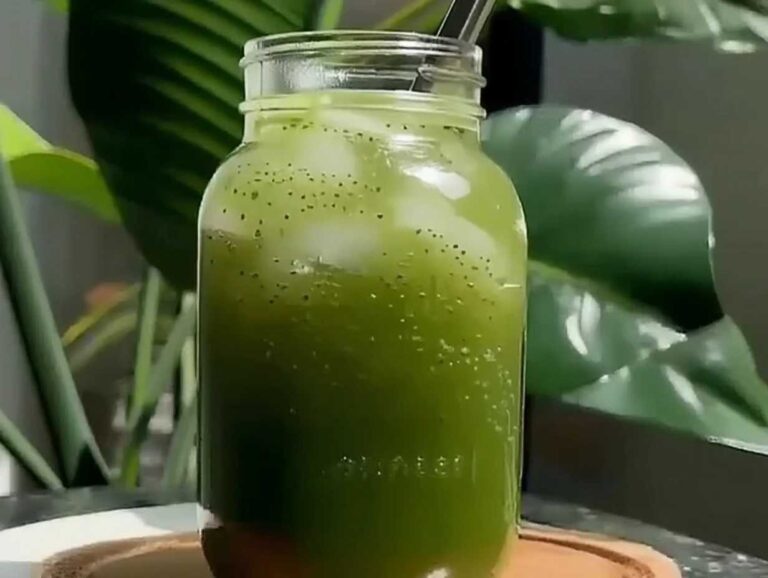 Matcha Chia Seed Lemonade: The Ultimate Summer Gut-Friendly Drink Matcha chia seed lemonade in tall glass over ice on marble countertop