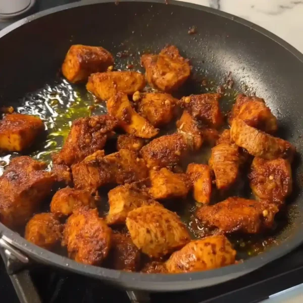 High Protein Street Corn Chicken Bowl with golden grilled chicken pieces