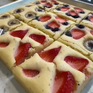 Sheet Pan Pancakes: The Easy Way to Feed a Crowd for Breakfast Sheet pan pancakes cooling on the counter, fluffy and golden