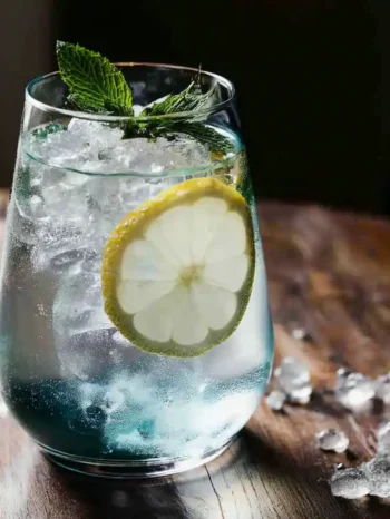 Blue Salt Trick Recipe – Natural Mineral Drink for Hydration & Energy Blue salt trick beverage with lemon slices and mint garnish