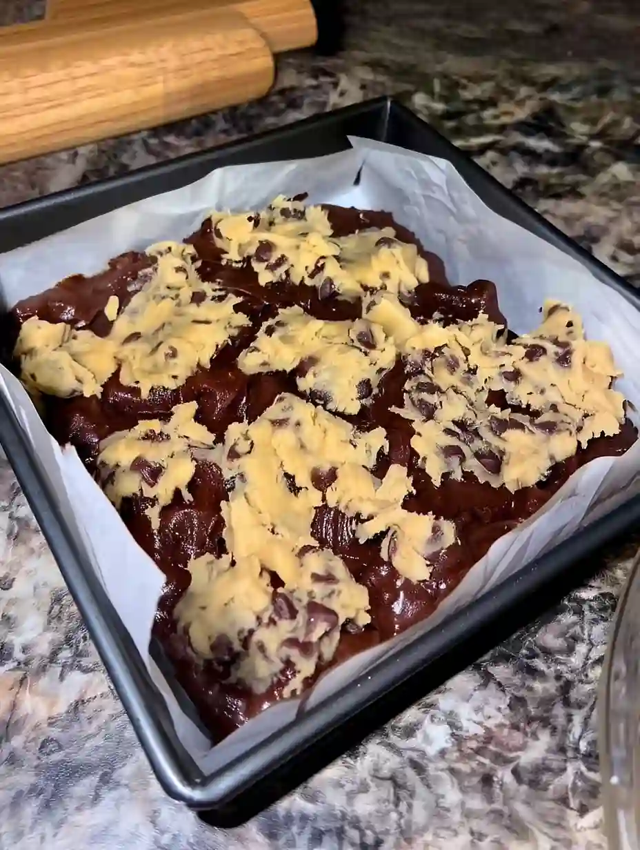 Brookies Recipe: Fudgy Brownie & Chewy Cookie in One Bite Raw brownie batter and cookie dough layered for Brookies
