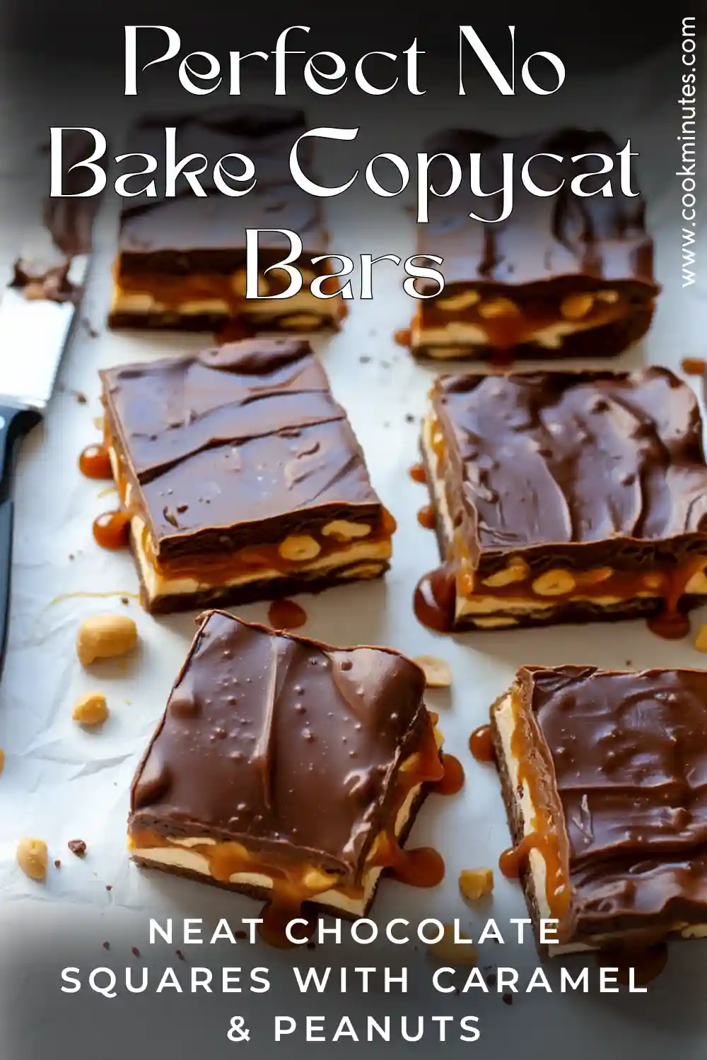 Homemade No Bake Snickers Bars (Copycat Recipe) Homemade no bake Snickers copycat bars sliced into neat squares with layers of chocolate, caramel, nougat, and peanuts