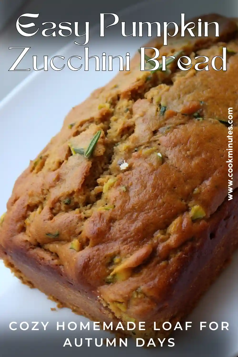 Pumpkin Zucchini Bread (Moist & Cozy Fall Loaf) Pumpkin Zucchini Bread whole loaf with golden brown crust