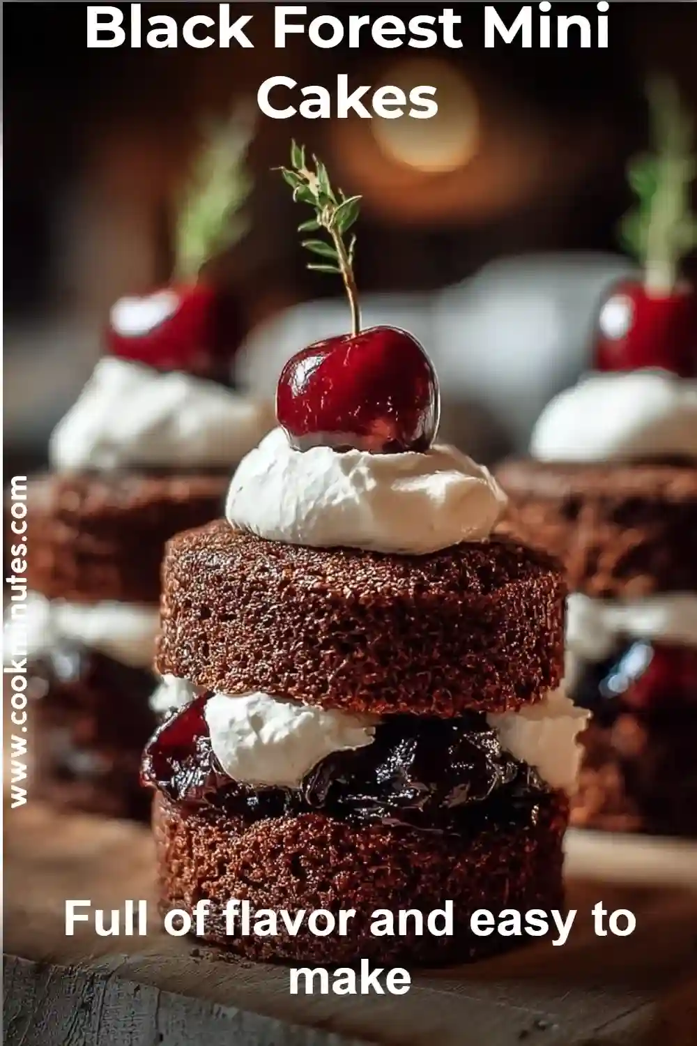 Black Forest Mini Cakes with layers of chocolate cake, whipped cream, and fresh cherries on top.