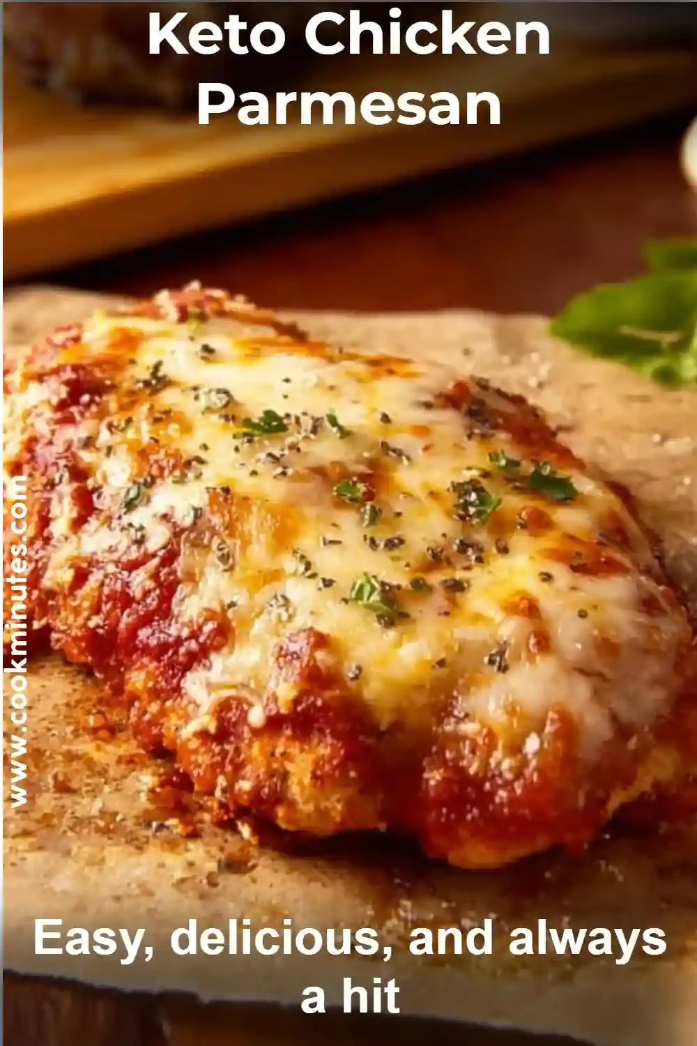 Keto Chicken Parmesan – Crispy, Cheesy & Low-Carb Comfort Food Golden keto chicken parmesan topped with cheese and herbs on a parchment-lined board