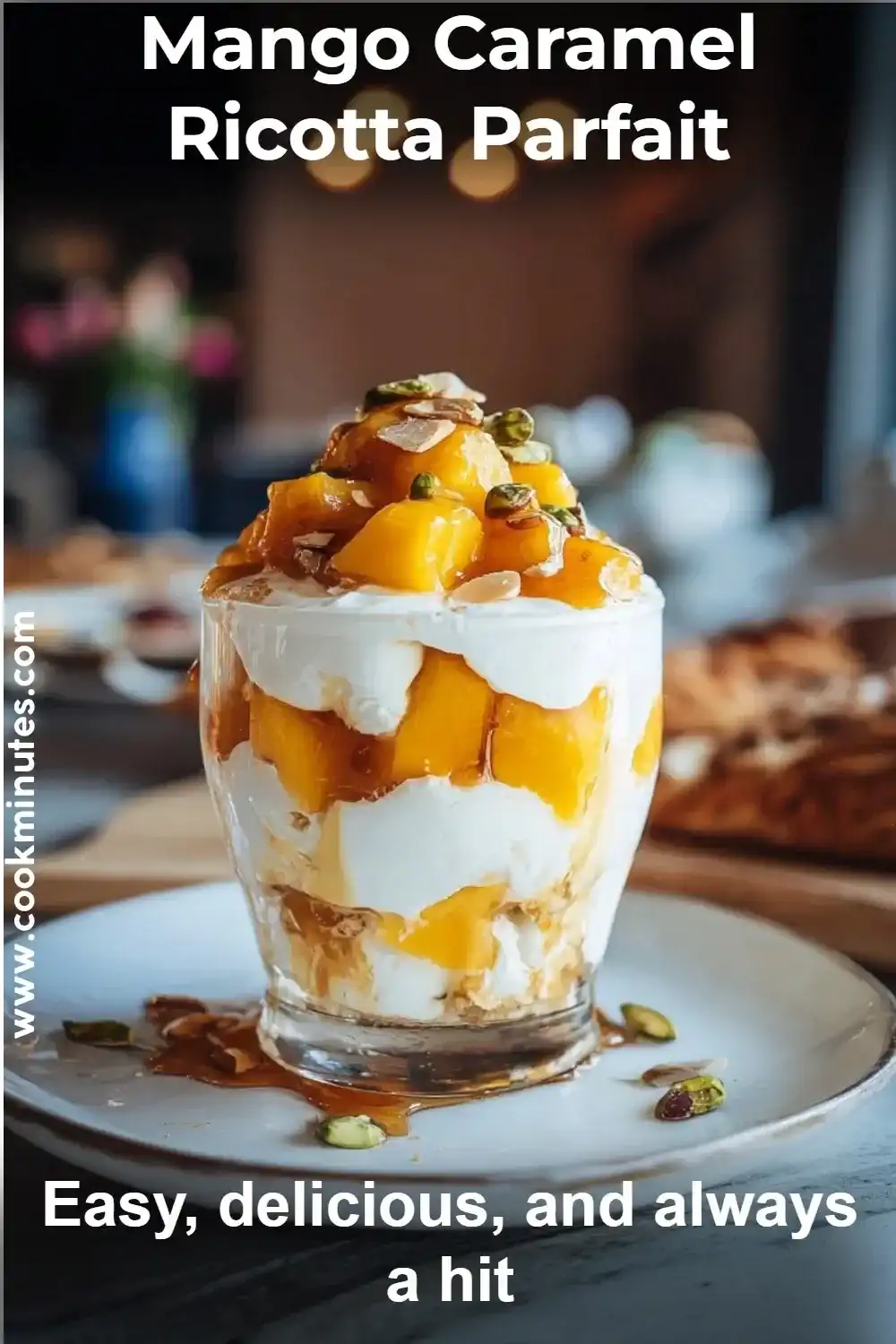 Mango caramel ricotta parfait layered in a glass with caramel drizzle and pistachio topping.