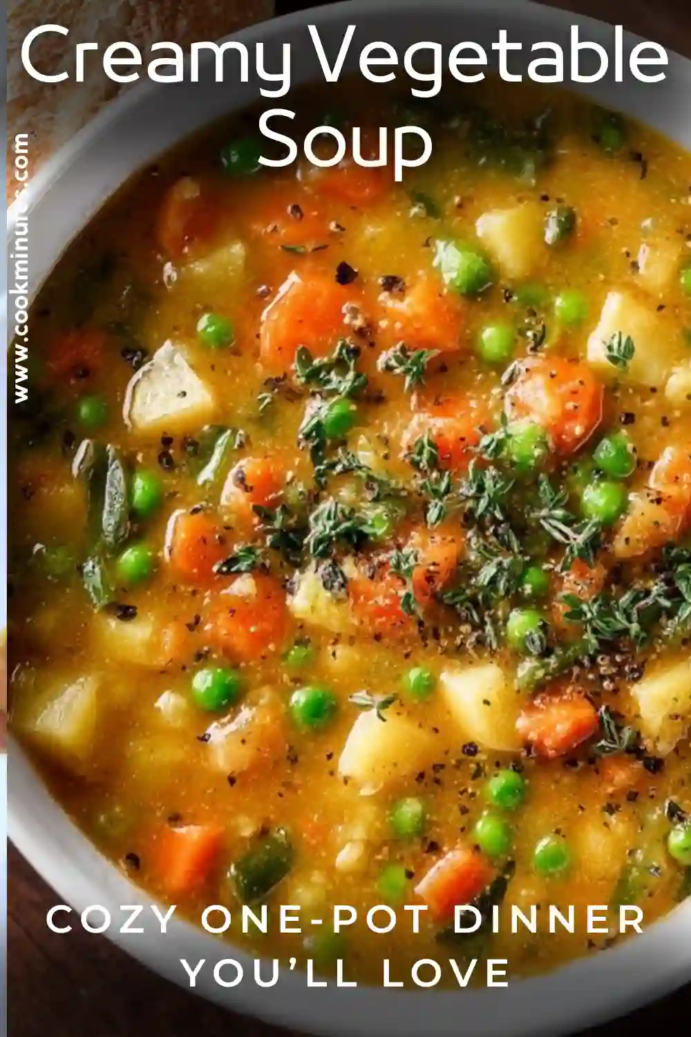 Comforting One-Pot Creamy Vegetable Soup Comforting One-Pot Creamy Vegetable Soup with carrots, peas, and potatoes in golden broth