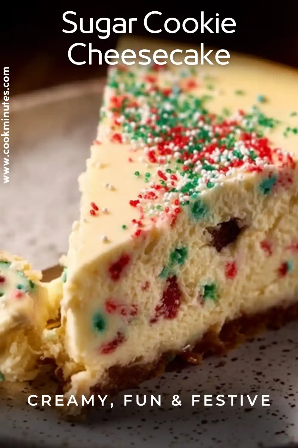 Sugar Cookie Cheesecake: Creamy, Festive & Sweet Sugar cookie cheesecake slice topped with sprinkles and creamy frosting