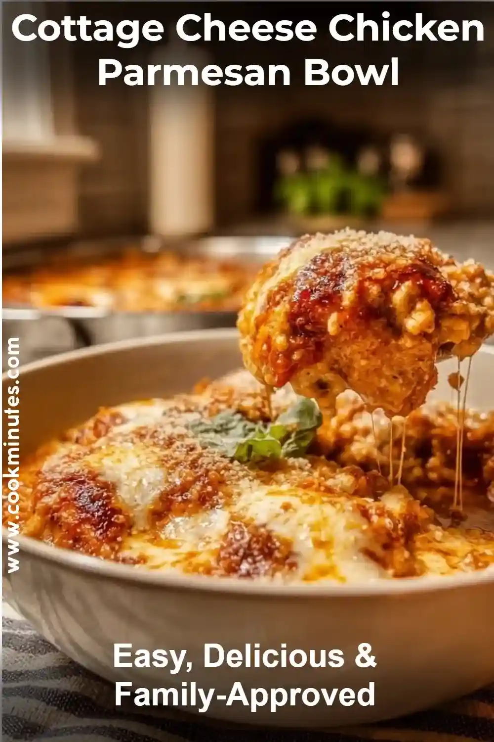 A delicious Cottage Cheese Chicken Parmesan Bowl garnished with fresh basil.