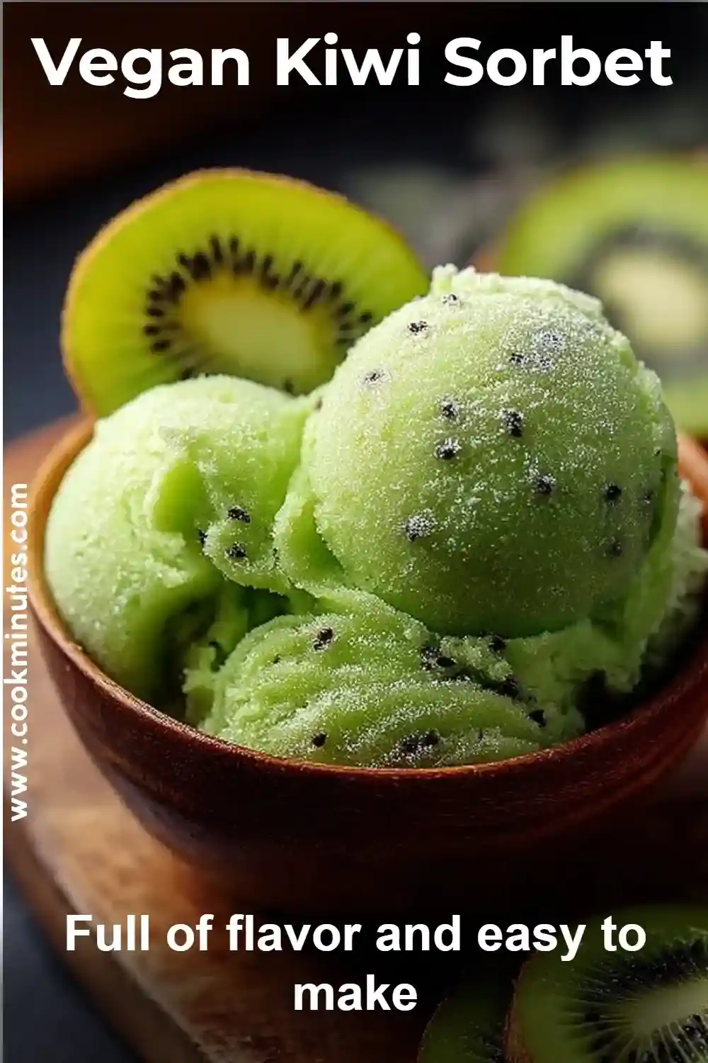 Vegan Kiwi Sorbet with fresh kiwi slices, mint leaves, and a vibrant green color in a glass bowl.