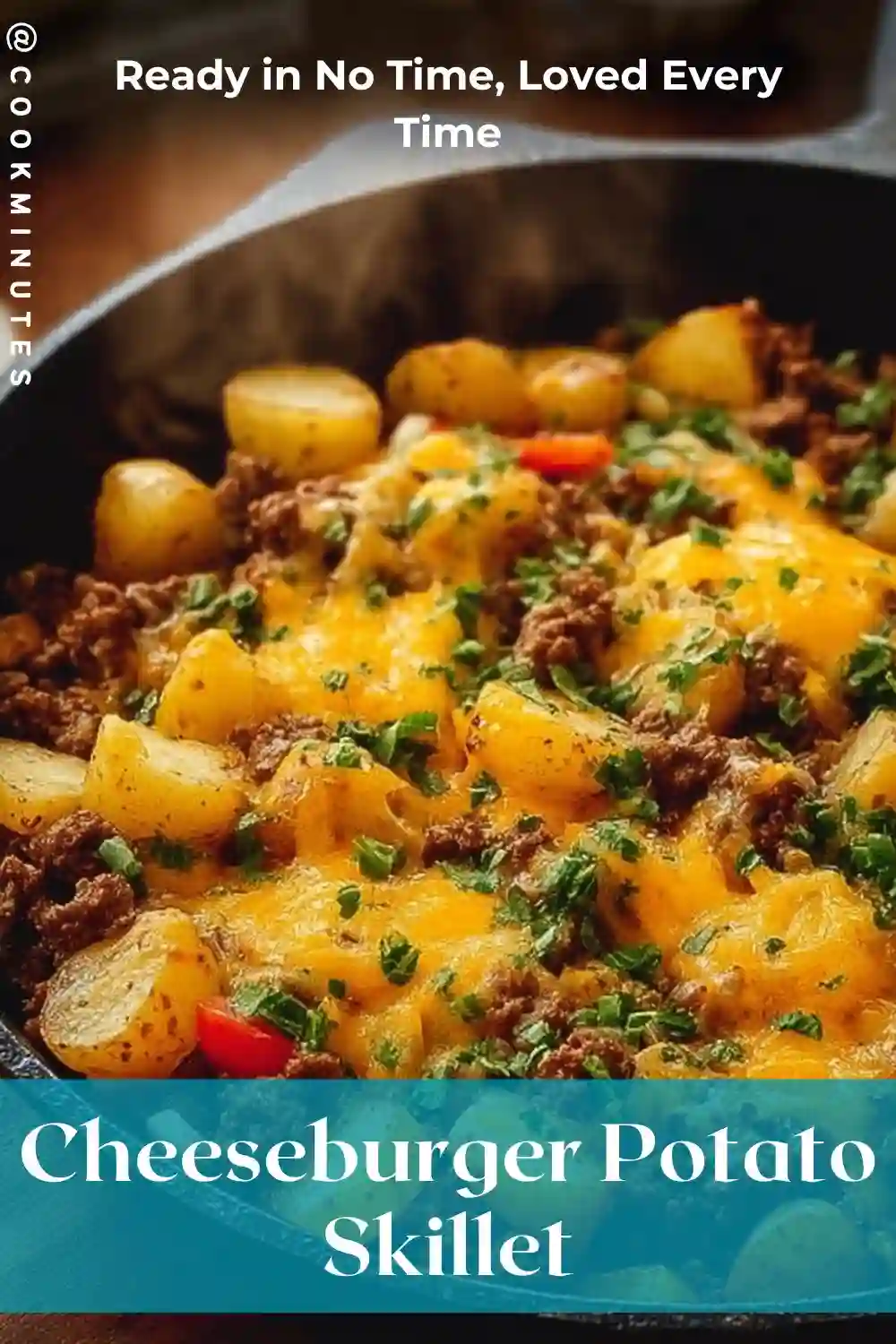 Cheeseburger Potato Skillet with beef, cheese, and golden potatoes in a black cast iron pan.
