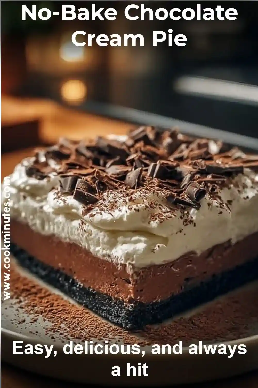 No-Bake Chocolate Cream Pie topped with whipped cream and chocolate shavings on a dark crust.