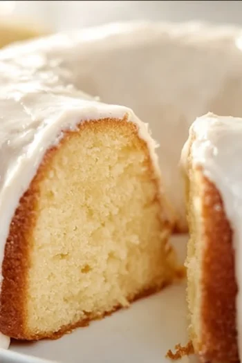 Vanilla Bundt Cake There's nothing quite like the aroma of a freshly baked Vanilla Bundt Cake filling the kitchen. It's a classic dessert that brings back a flood of memories, like the time my grandmother taught me the secrets of her favorite baking recipes. This Vanilla Bundt Cake is not just about taste; it's about sharing moments, igniting nostalgia, and creating traditions. Whether you're celebrating a birthday, a family gathering, or simply craving something sweet, this cake has your back. Dive in, and let's bake together, this delicious creation awaits you! Vanilla Bundt Cake