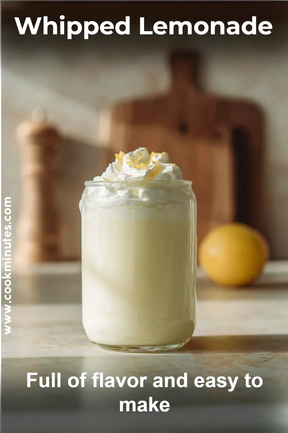 Fluffy Whipped Lemonade topped with a lemon slice 