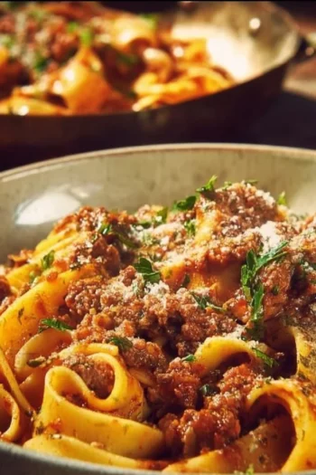 "Experience the warm embrace of homemade Bolognese Sauce, a timeless Italian delight!" Bolognese Sauce