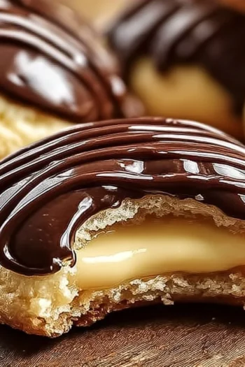Boston Cream Pie Cookie Bites are an easy, delightful twist on the classic dessert that combines rich chocolate, creamy custard, and soft cookie goodness. Boston Cream Pie Cookie Bites