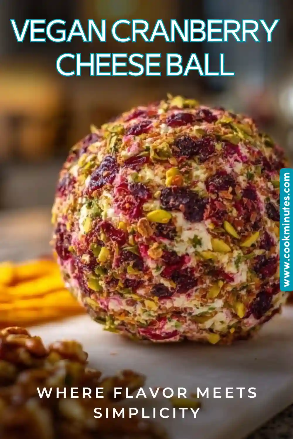 Delicious Vegan Cranberry Cheese Ball with colorful pistachios.