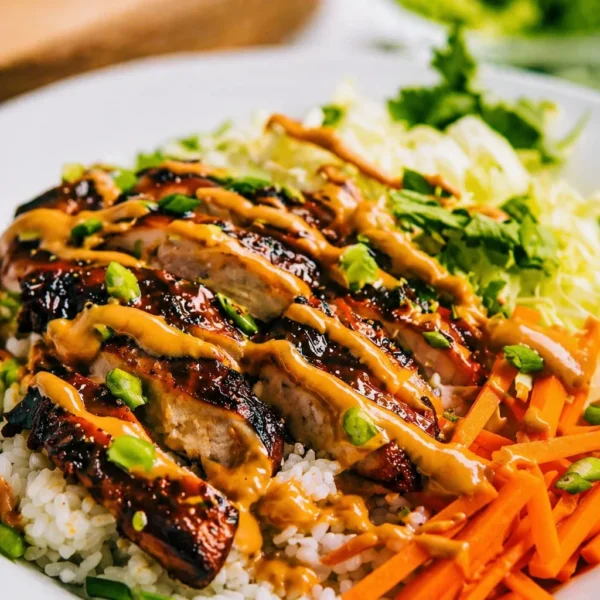Flavorful Grilled Chicken Rice Bowls with fresh vegetables and delicious toppings.