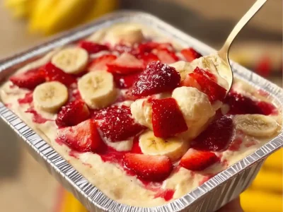 Delicious strawberry banana pudding with fresh fruit garnish