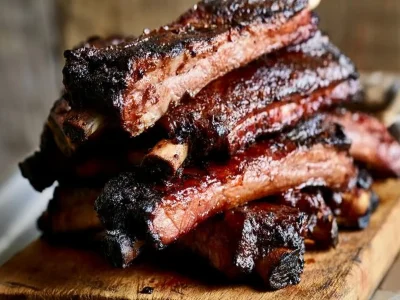 Deliciously smoked BBQ ribs glazed with a sweet and smoky sauce.