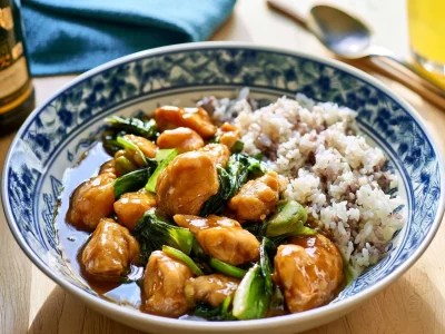 Delicious Chicken Bok Choy Stir-Fry served in a bowl with rice and vegetables.