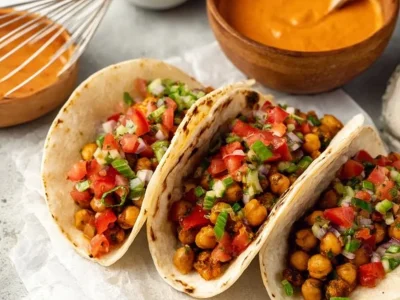 Delicious chickpea tacos topped with fresh vegetables and salsa