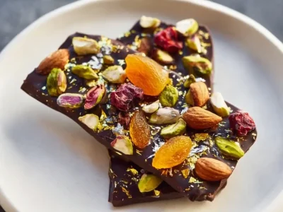 Dubai Chocolate Bark Treat garnished with golden raisins and pistachios.
