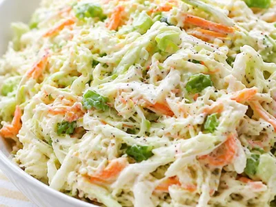 Delicious coleslaw for BBQ served with pulled pork at a summer cookout.