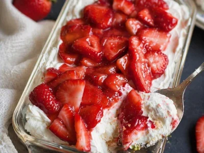 Delicious no-bake Strawberry Angel Food Dessert with fresh strawberries and cream.