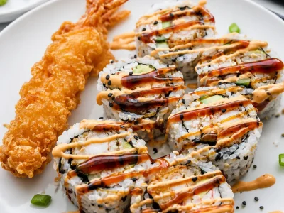 Dynamite sushi roll with shrimp tempura, spicy mayo, and cucumber.