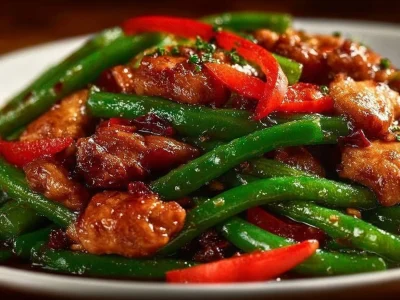 Garlicky Sweet Thai Chili Chicken and Green Beans Stir Fry on a plate