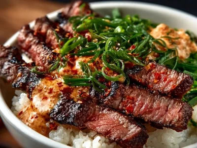 Delicious Korean BBQ steak rice bowl with colorful vegetables and rice