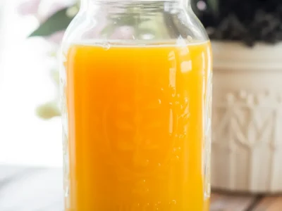 Freshly made Jamu Juice Recipe, an Indonesian turmeric ginger drink with health benefits.