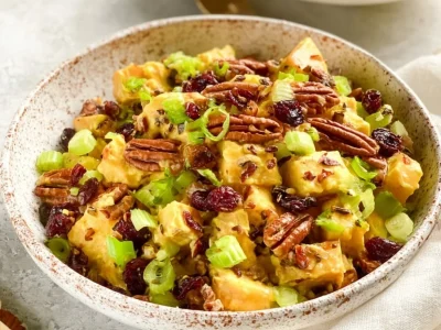 Pecan Cranberry Chicken Salad with nuts and cranberries in a bowl