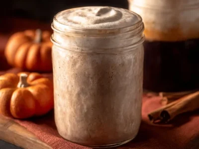 Delicious Pumpkin Cold Foam coffee drink topped with whipped cream and spices.