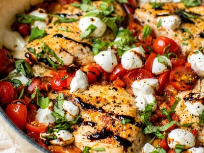 Juicy Caprese Chicken Skillet with mozzarella, tomatoes, and basil ready in 30 minutes.